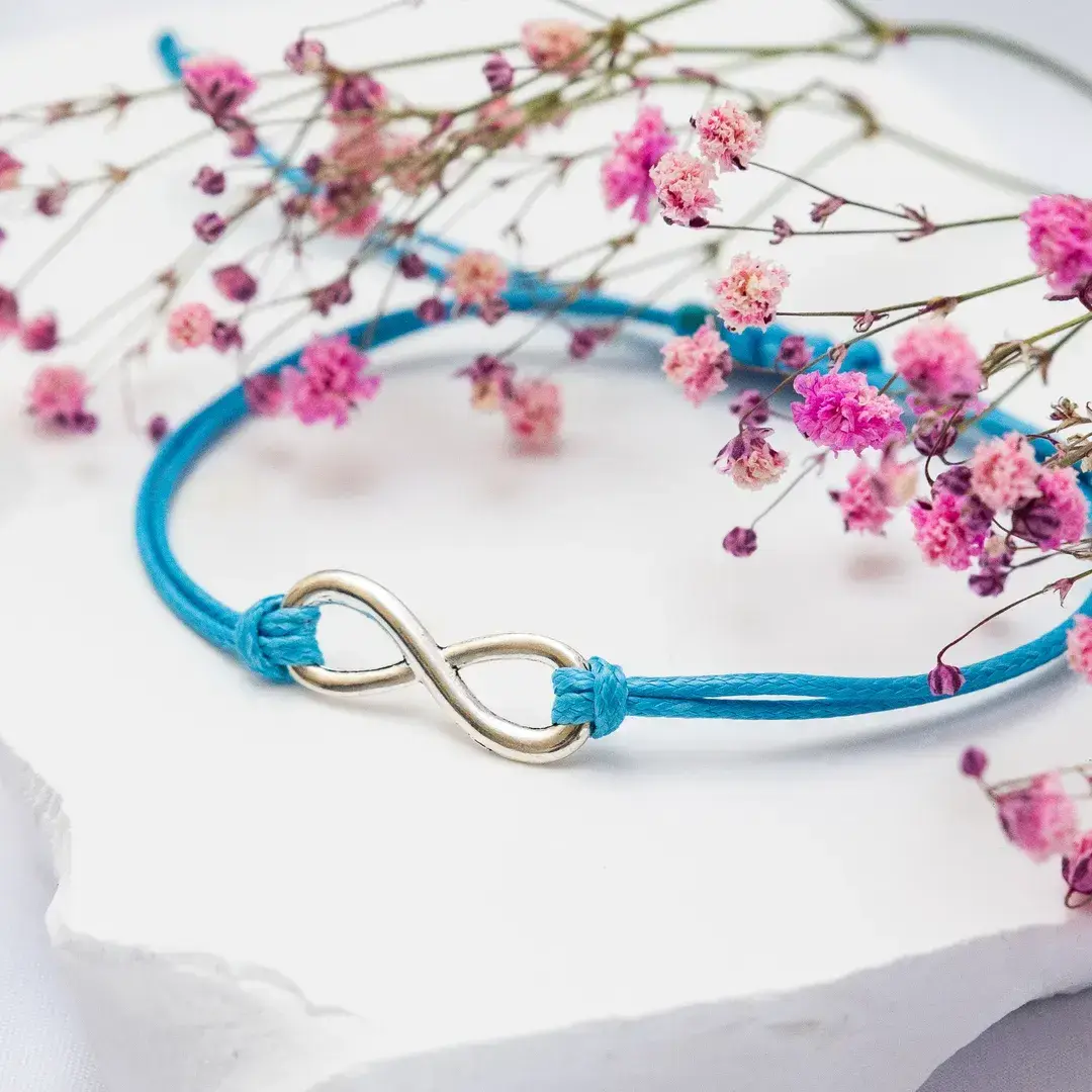 BRANSOLETKA-SZNURKOWA-ZNAK-NIESKOŃCZONOŚĆ-SZCZĘŚCIA-SREBRNA-NIEBIESKA