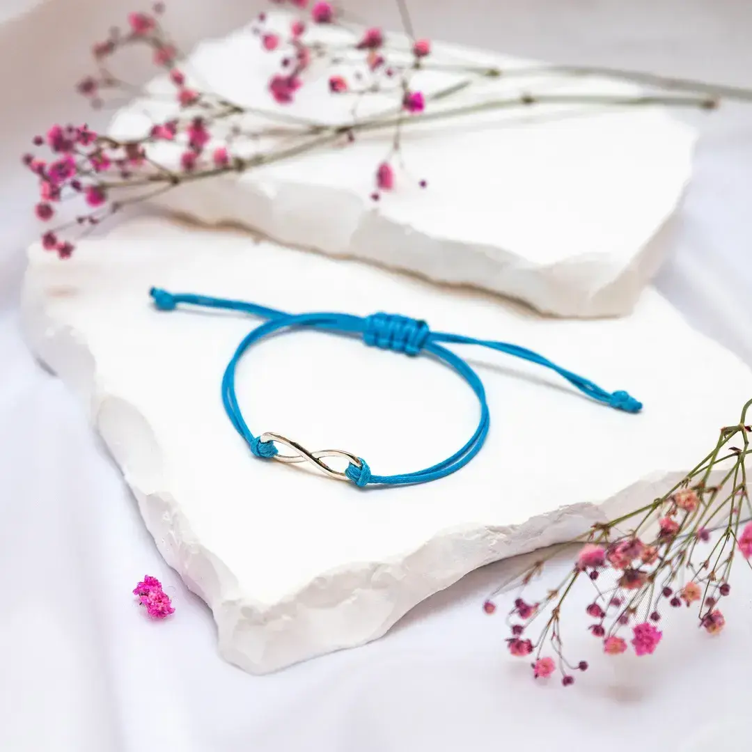 BRANSOLETKA-SZNURKOWA-ZNAK-NIESKOŃCZONOŚĆ-SZCZĘŚCIA-SREBRNA-NIEBIESKA