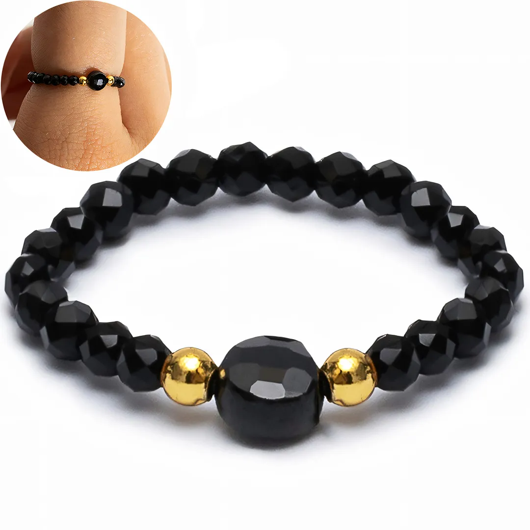 Pierścionek elastyczny czarny turmalin złoty stal 316l