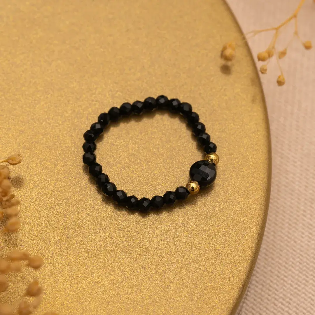 Pierścionek elastyczny czarny turmalin złoty stal 316l